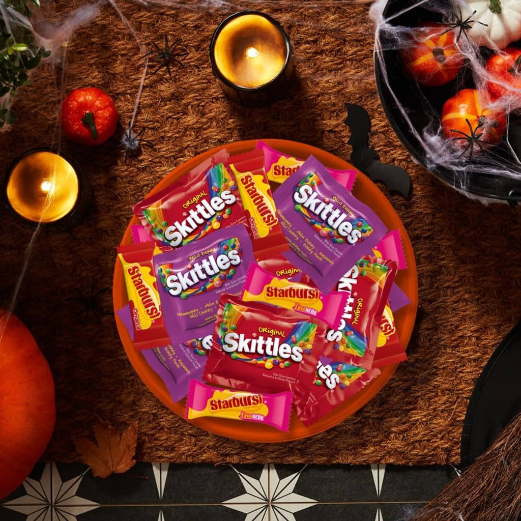 Assorted candy bags and wrappers in a bowl display