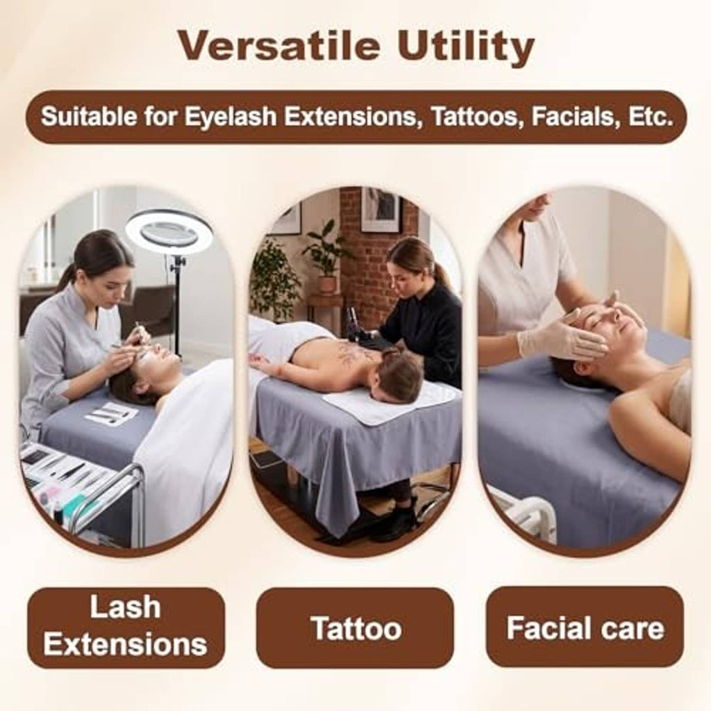 Gray massage table sheet used for facials and lash or tattoo treatments