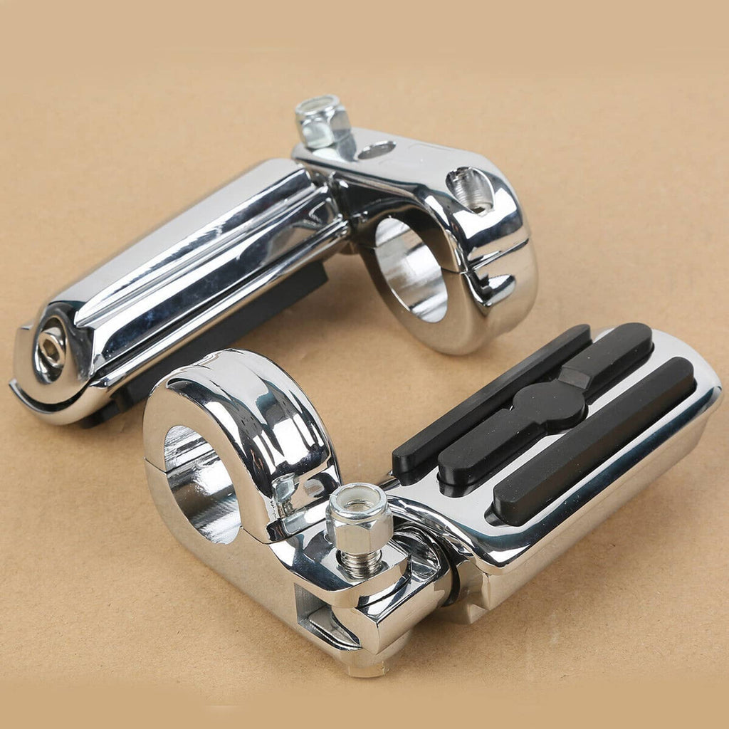 Chrome crash bar footpegs with black rubber inserts and forked mounting straps