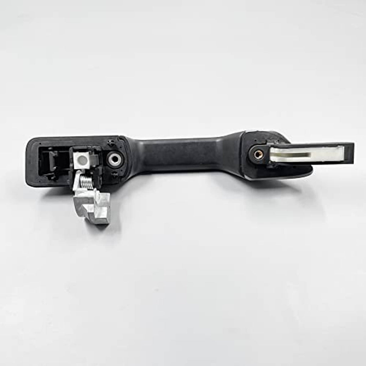 Exterior door handle interior view showing mounting hardware and connector