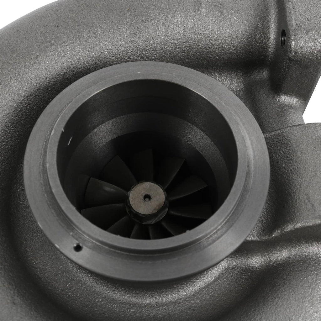 Turbocharger compressor inlet with circular housing and black fan blades