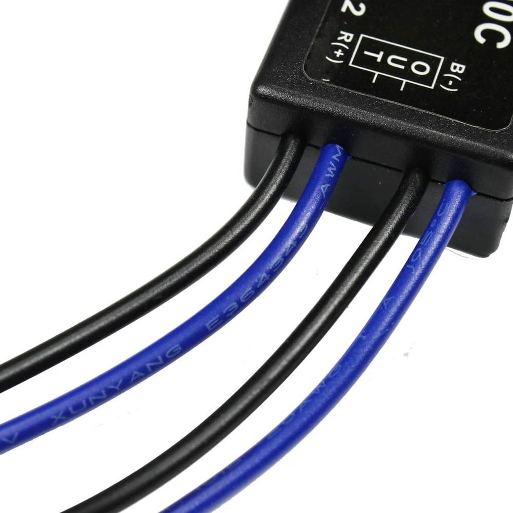 Close-up of strobe controller terminals with blue and black wire leads