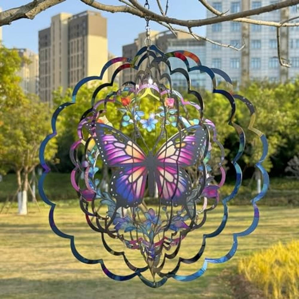 Butterfly wind spinner centerpiece with rainbow metal discs, purple-pink butterflies, and chain
