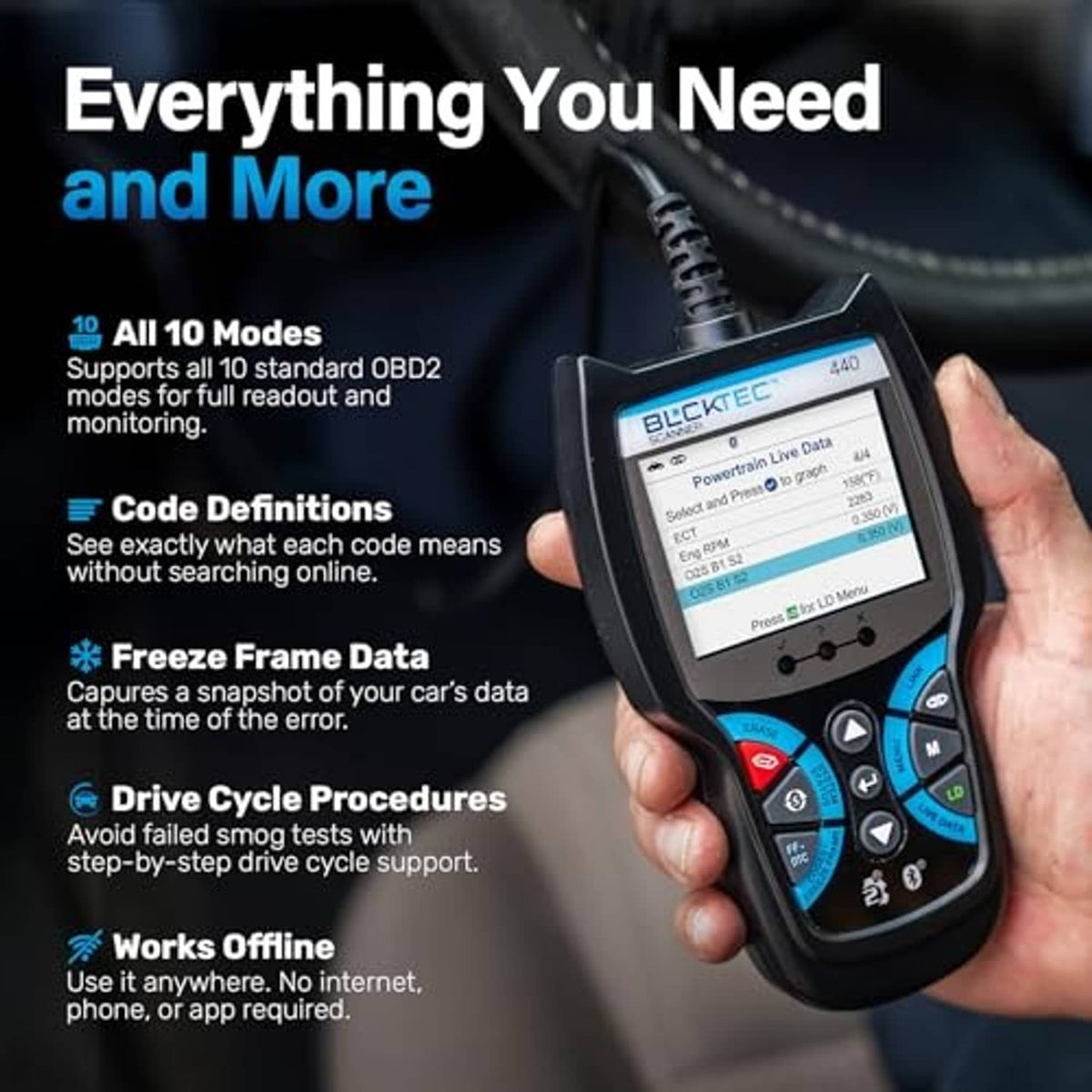 Handheld Bluetooth OBD2 scanner held in hand with backlit diagnostic screen