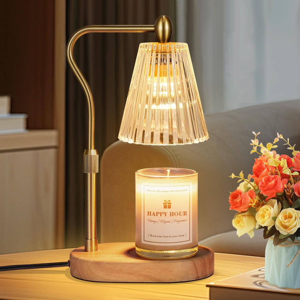Amber glass candle warmer lamp with wooden base and illuminated candle jar