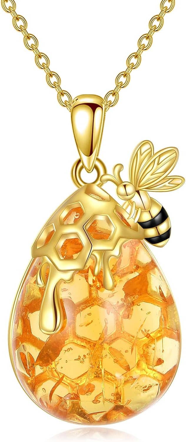 Gold bee amber teardrop pendant necklace, front view on gold-tone chain