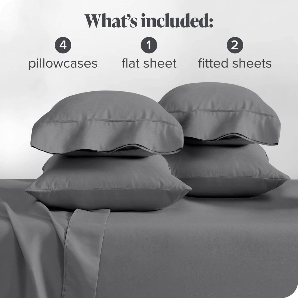 Grey microfiber bedding set with four pillowcases and layered flat and fitted sheets