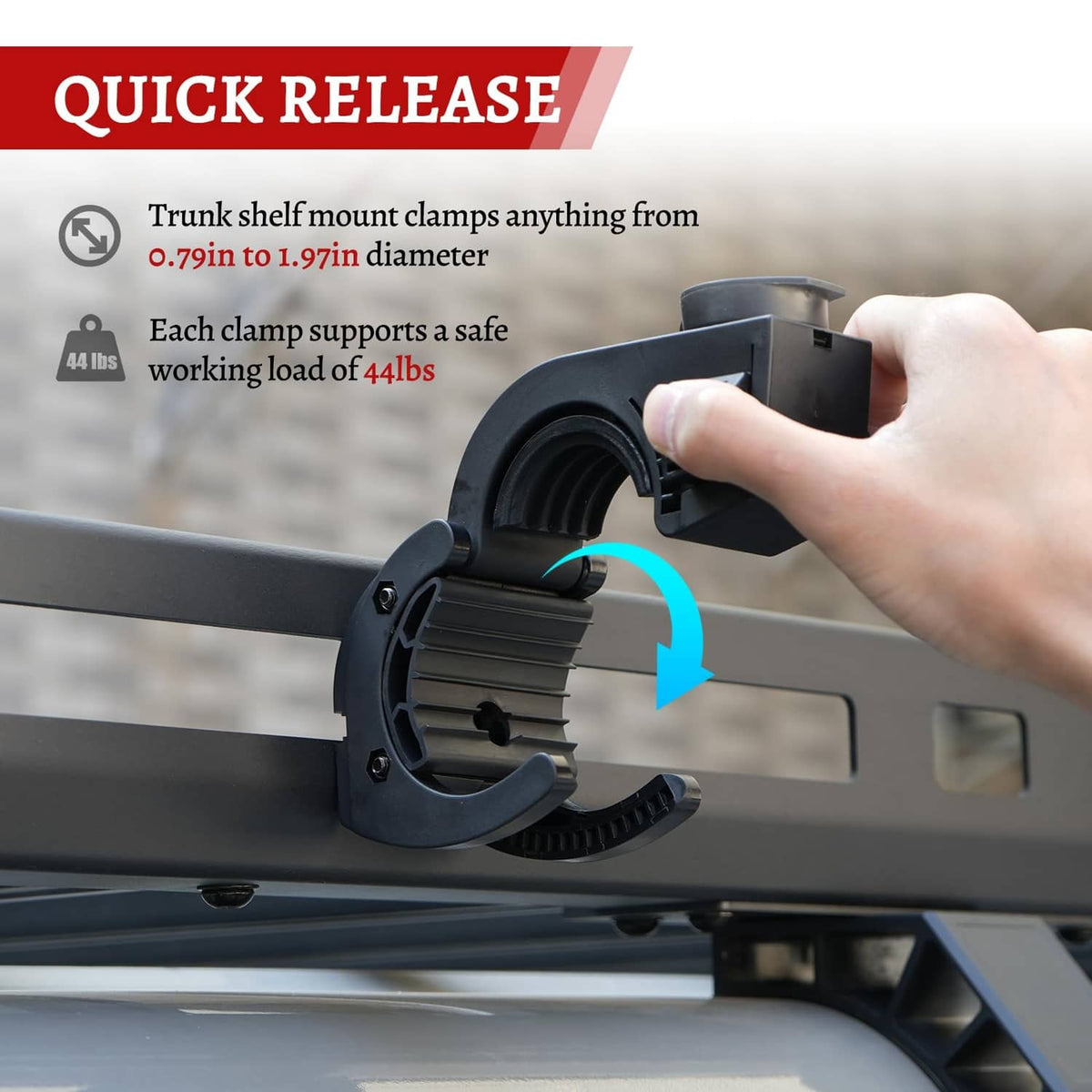 Black shovel holder rubber grip mount clamp with quick release shown by hand