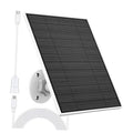 Solar panel charger with dark photovoltaic panel, white cable, and wall socket mount