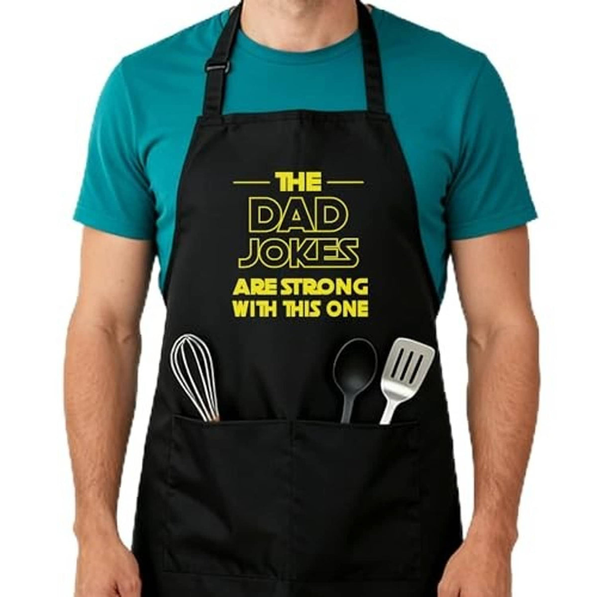 Black kitchen apron with utensil graphic, adjustable neck strap, and front pocket