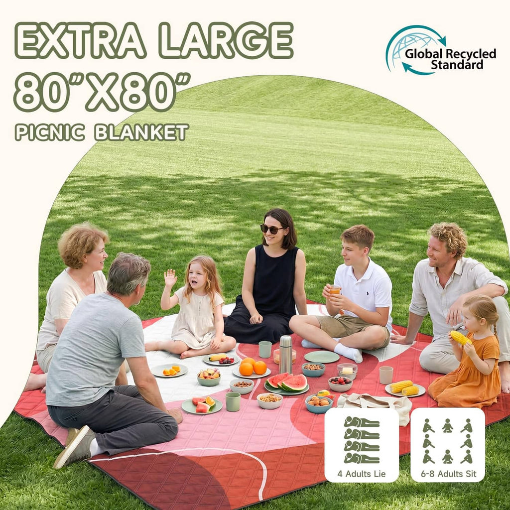 Extra-large green picnic blanket with white wave border pattern.