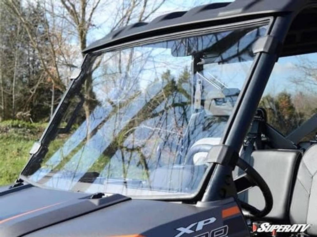 Clear windshield panel and frame on Polaris Ranger XP 900, close-up detail