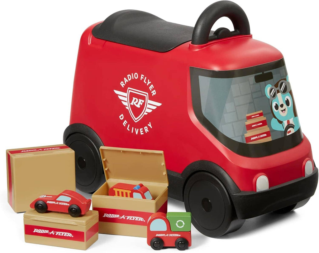 Red ride-on delivery van toy with black seat, front window, and small boxed vehicle