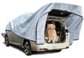 Car shade cloth in gray reflective mesh, draped over the open rear area