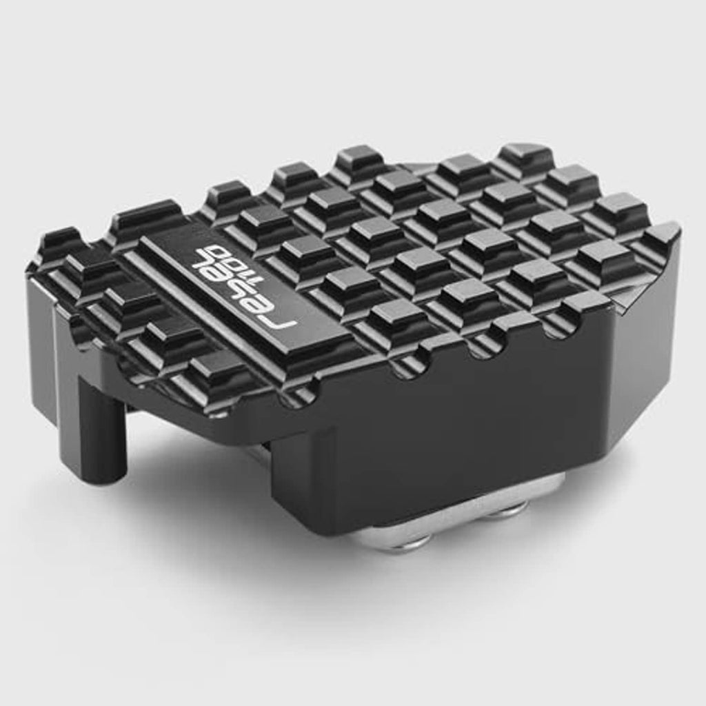 Black textured brake pedal extension block with treaded top surface