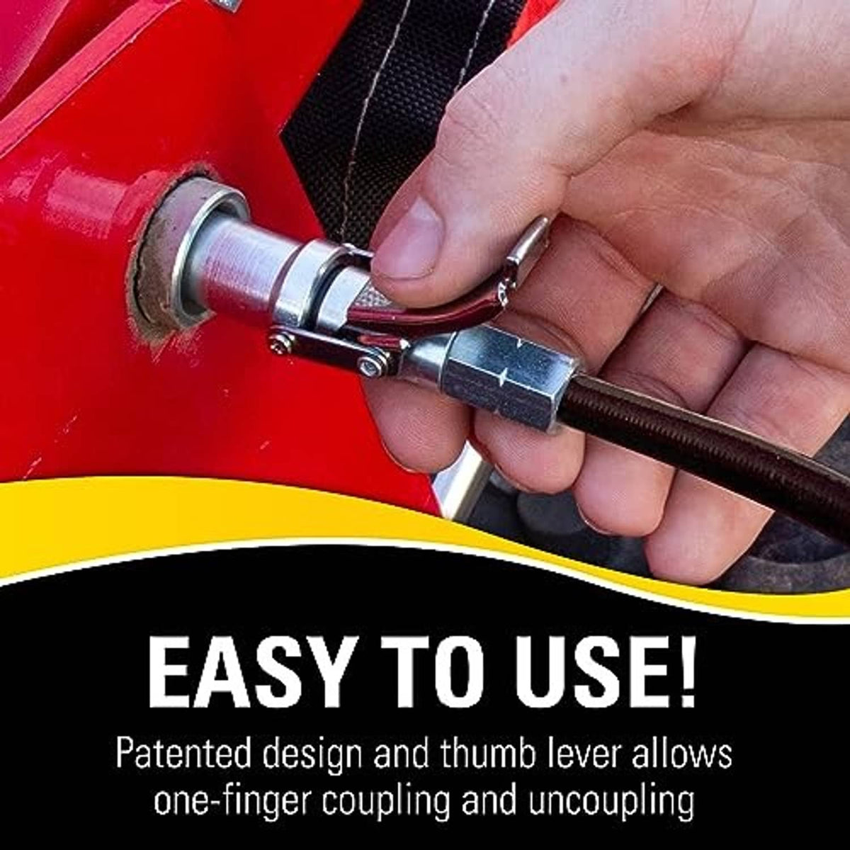 Heavy-duty quick release grease coupler held by hand, showing locking lever