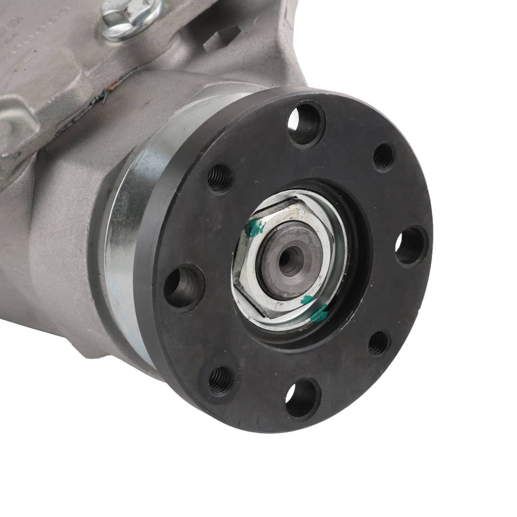Close-up of front differential carrier assembly with black flange and axle hub center