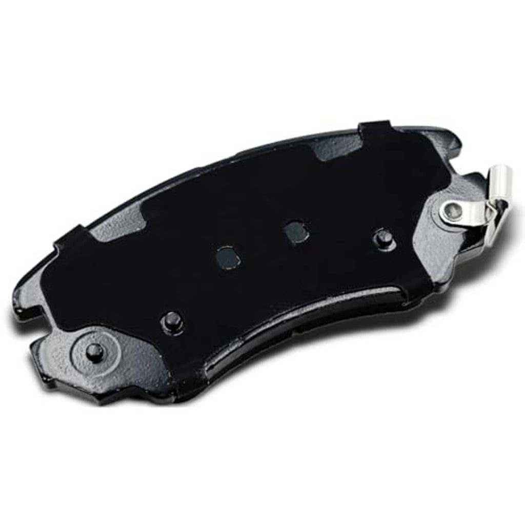 Ceramic brake pad with black backing plate, bolt holes, and metal retaining clips