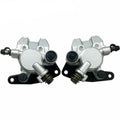 Front brake caliper assembly, silver metal housing with black rubber boots and pads