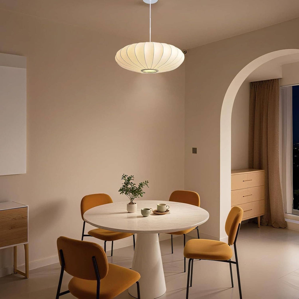 Cream-white ribbed bubble lantern pendant light hanging over dining area