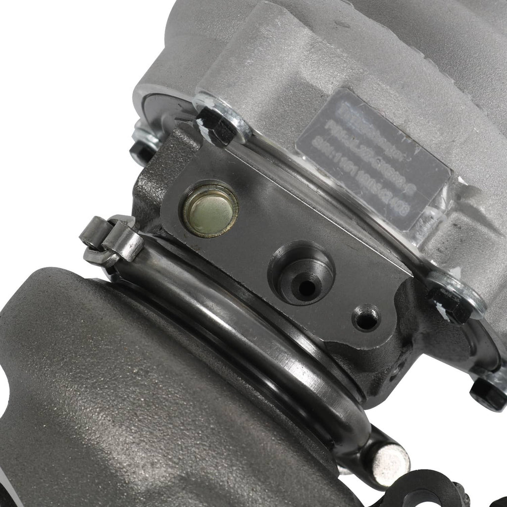 Turbocharger with actuator and metal housing ports, side view
