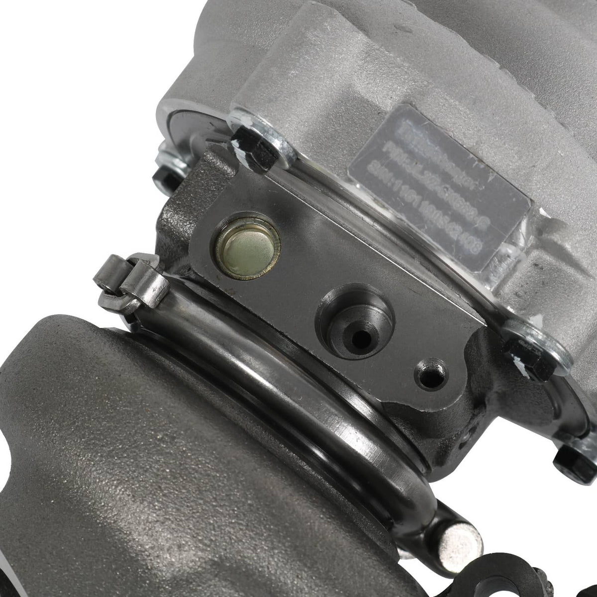 Turbocharger with actuator and metal housing ports, side view
