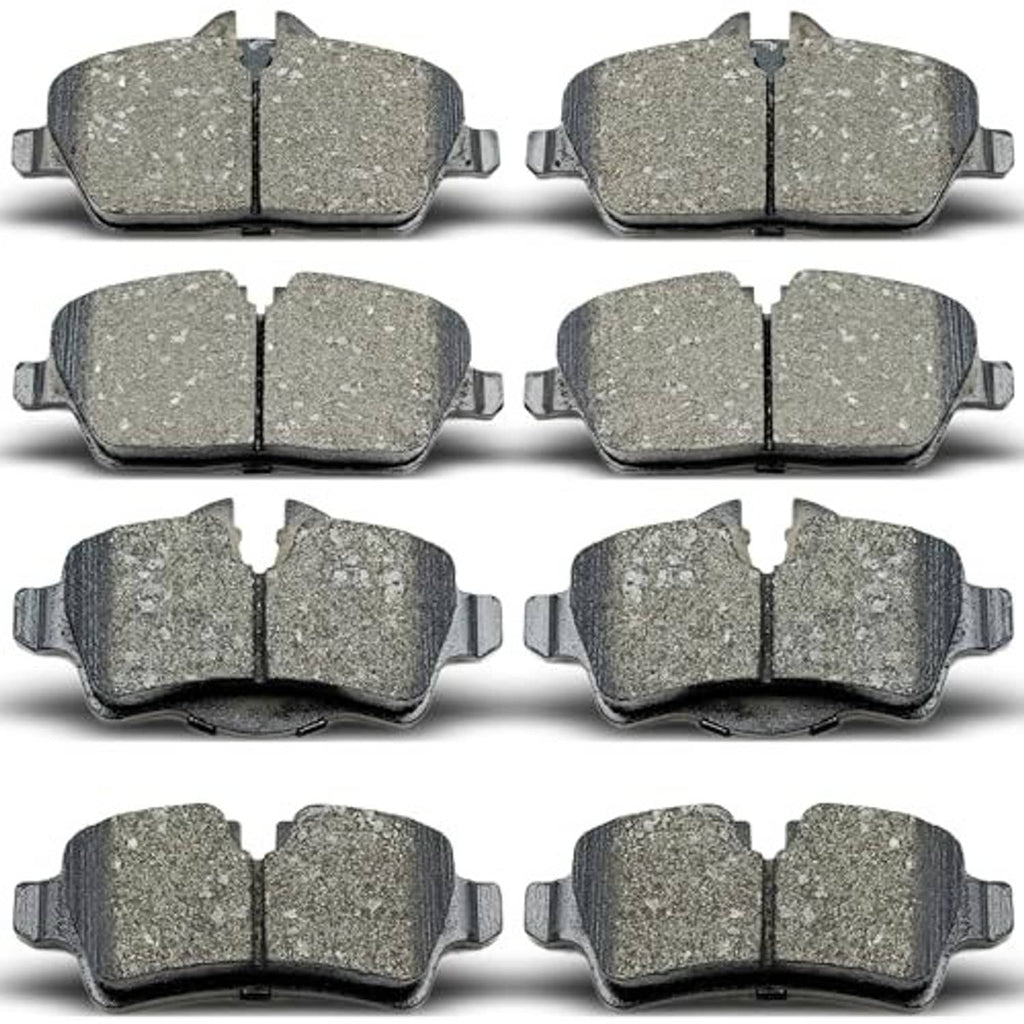 Ceramic brake pads set, array of grey friction pads with retaining metal clips