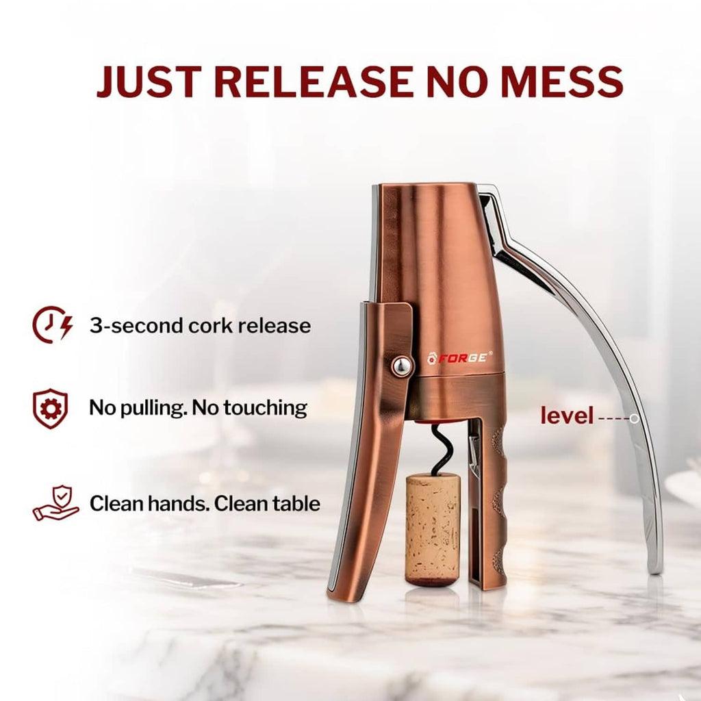 Copper wine opener with tall lever arm and cork released beside bottle