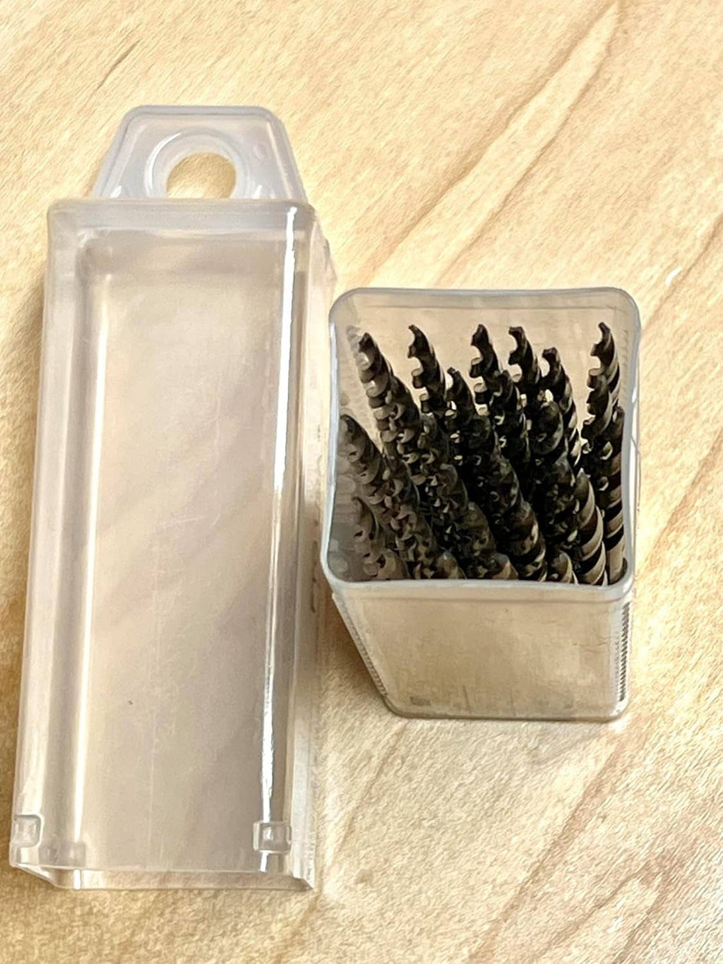 Extendable translucent storage case with countersink drill bits in the compartment
