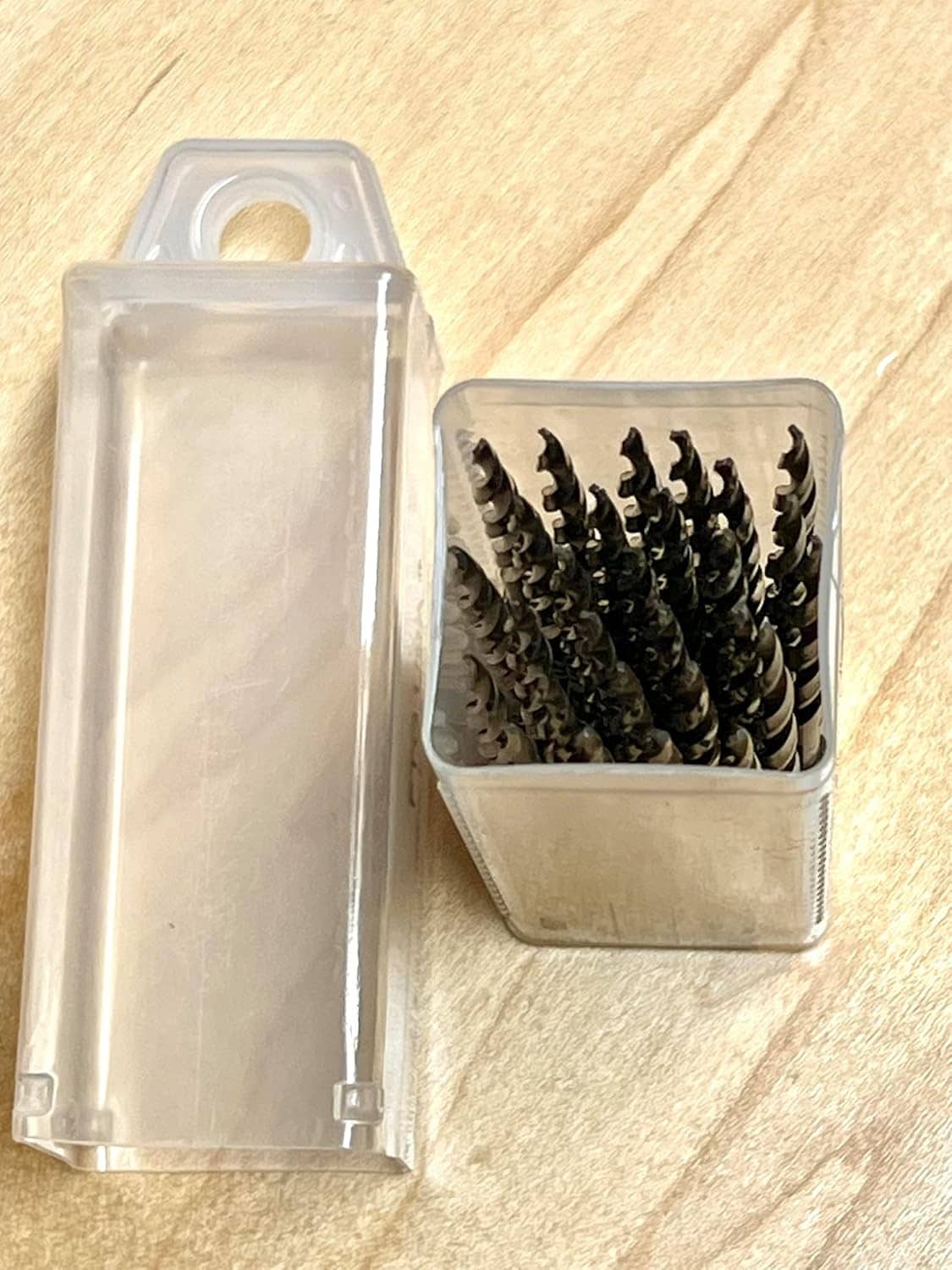 Extendable translucent storage case with countersink drill bits in the compartment