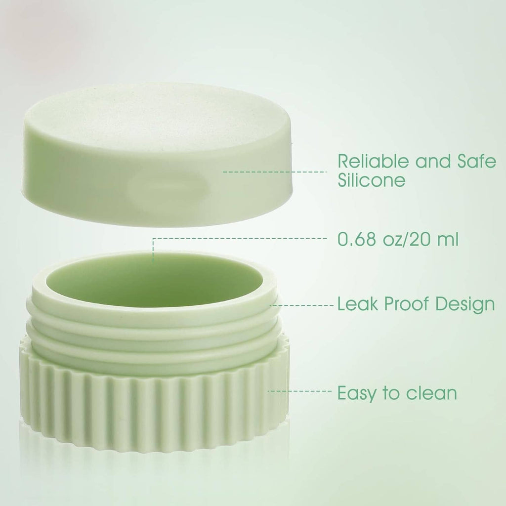 Small silicone travel jar in pale green with ribbed sides and open lid