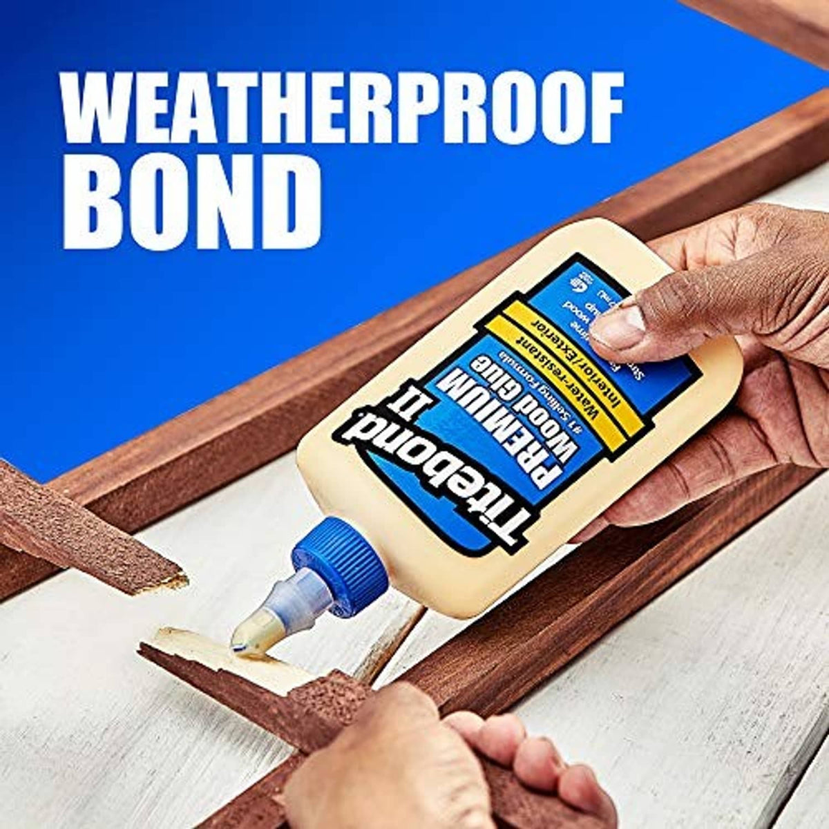 Titebond II premium wood glue bottle applying waterproof bond along wooden boards