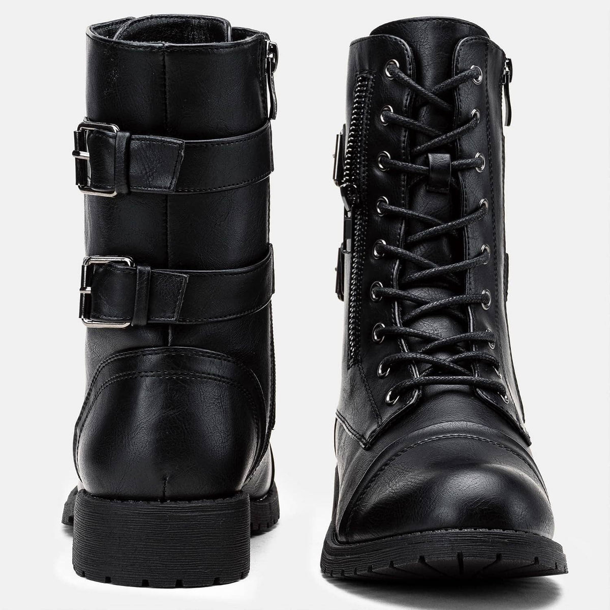 Pair of black mid-calf combat boots with lace-up front and side buckled straps