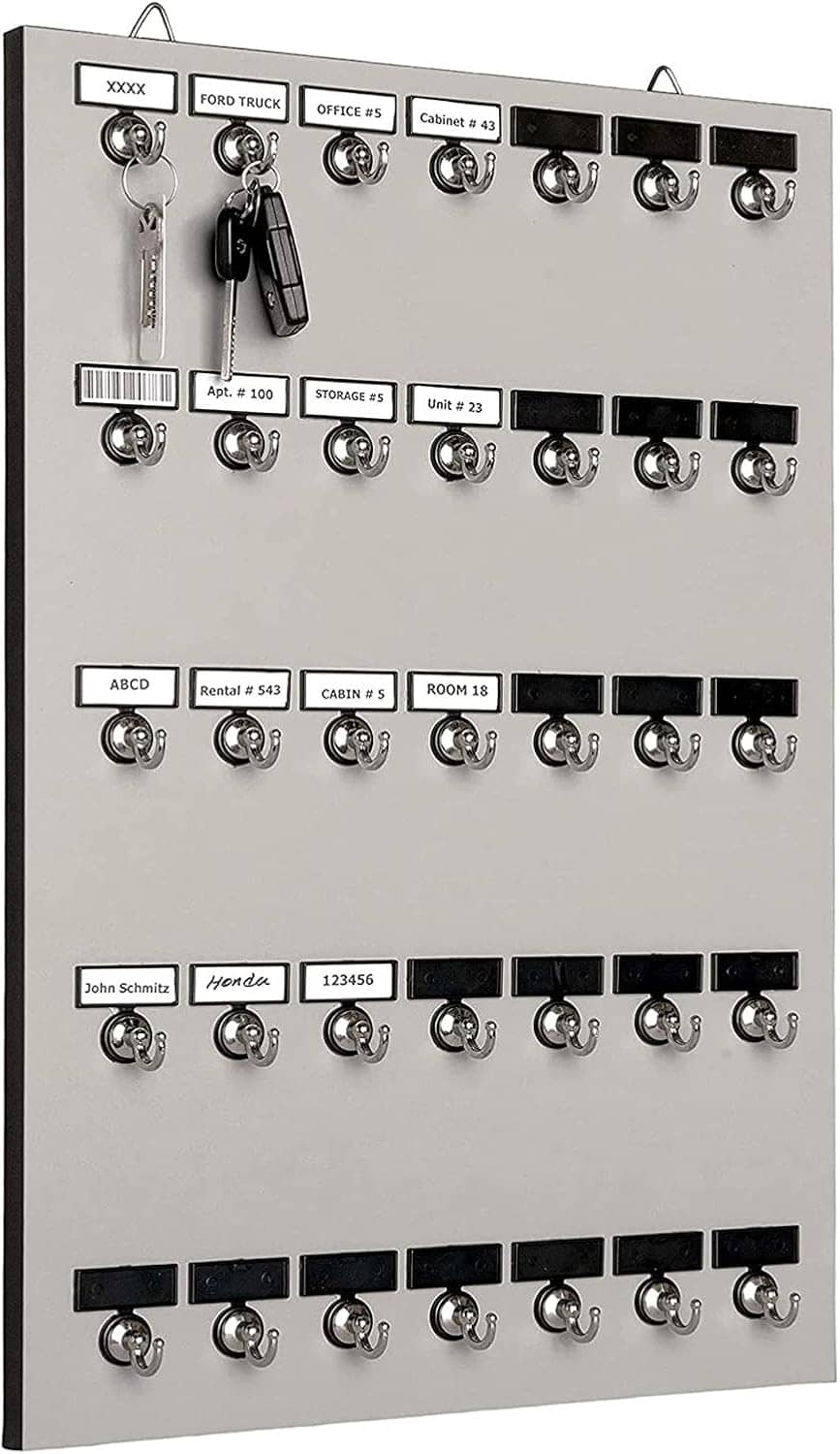 Wall-style key hook rack with many chrome hooks on a gray board with black rails