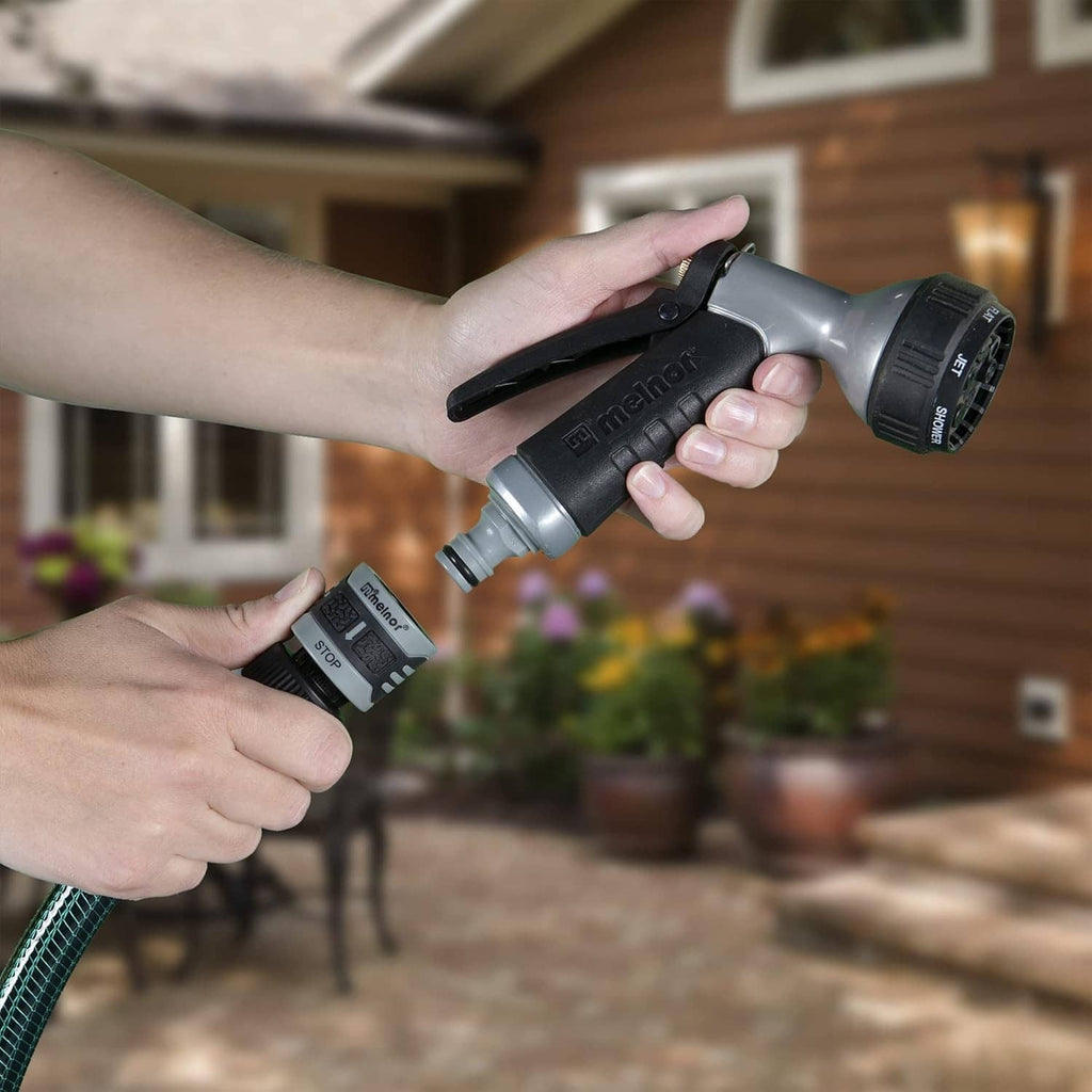 Quick Connect starter set with gray and black handle connectors, being attached to a hose