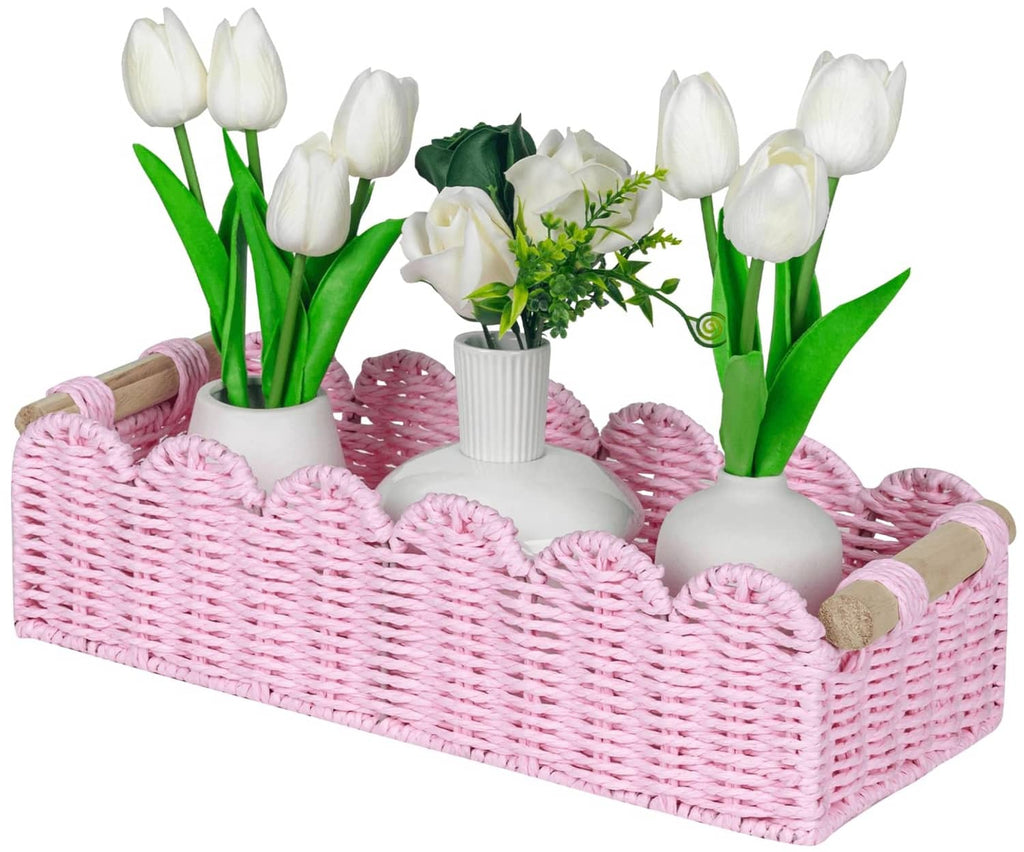 Pink paper rope gift basket with scalloped rim, tulip-style bouquet, and two side handles