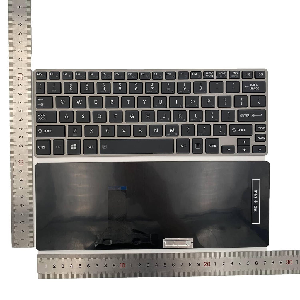 Black laptop replacement keyboard with key legends and bottom cutouts