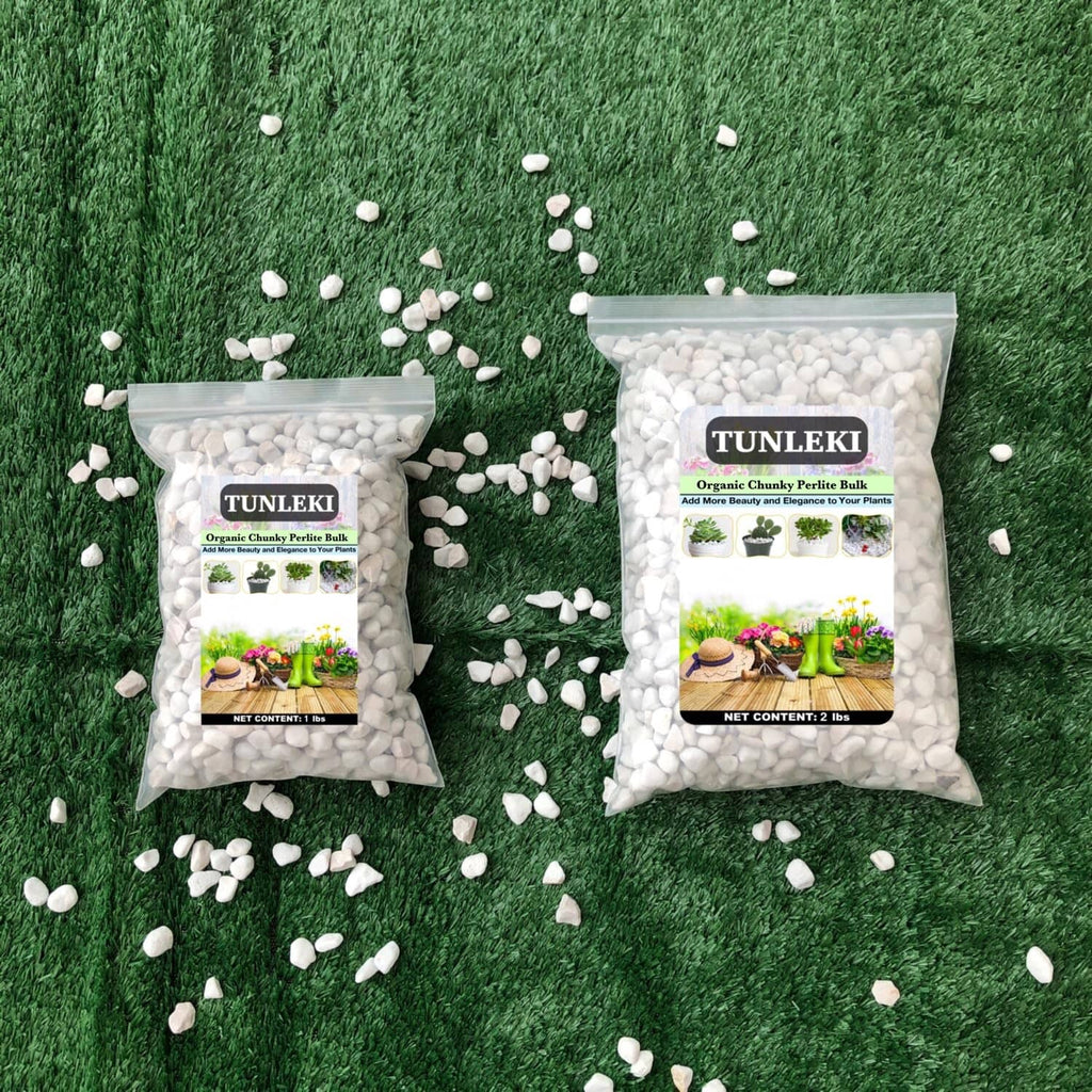 Two TUNLEKI chunky perlite bulk bags with scattered white stones on grass