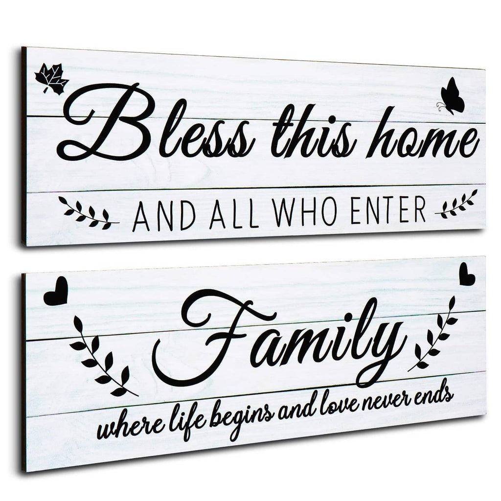 Rustic wooden wall sign reading “Bless this home” with butterflies and “And all who enter”
