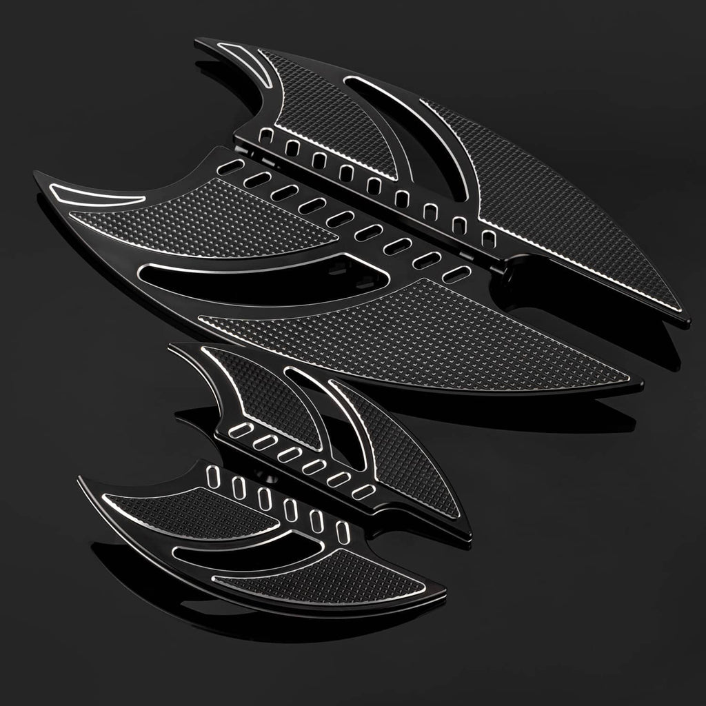 Set of textured black motorcycle floorboards with silver curved accents and pedal holes