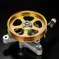 Power steering pump with rainbow-gold pulley and metal mounting bracket, hose port