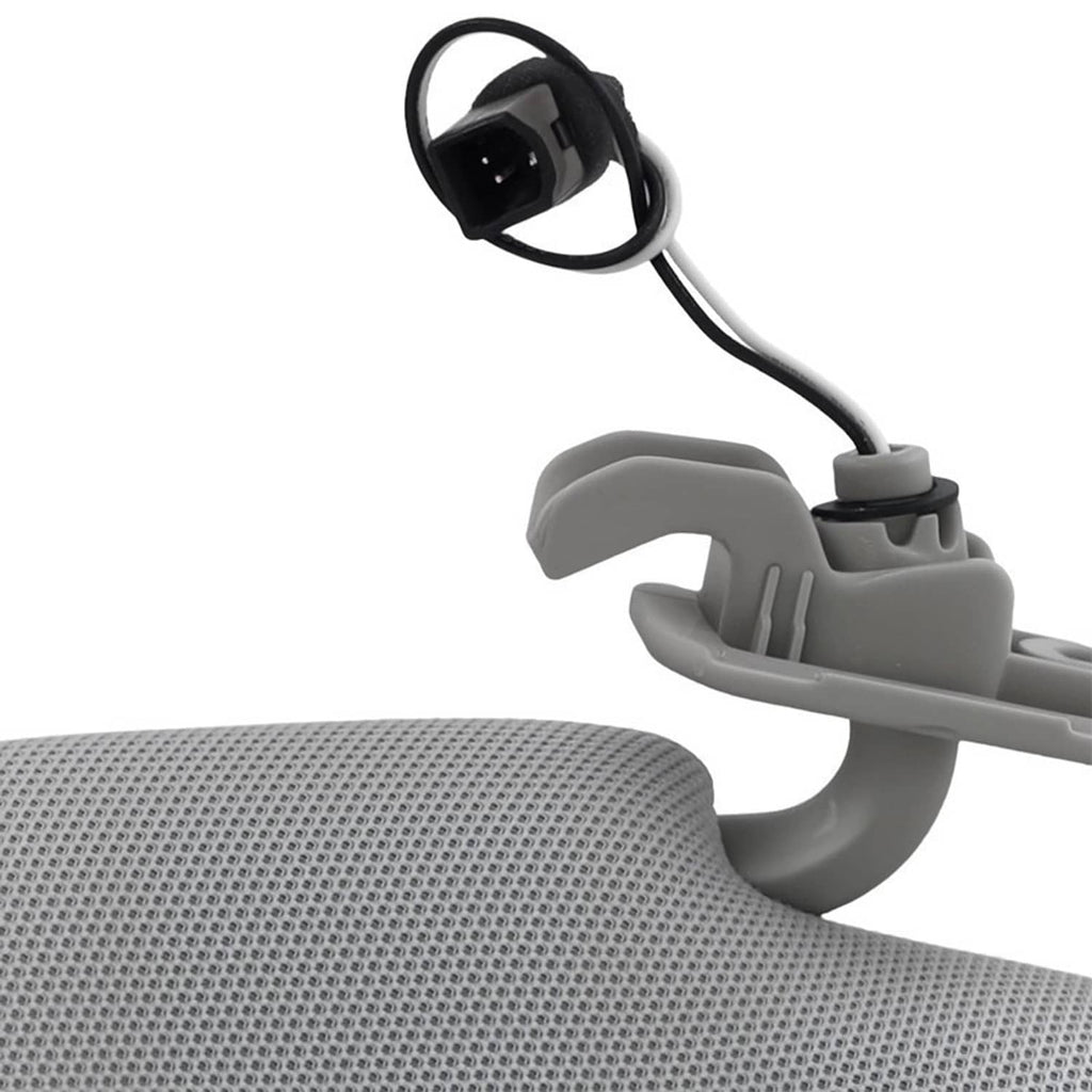 Gray sun visor mounting arm with wiring and connector, shown near textured panel