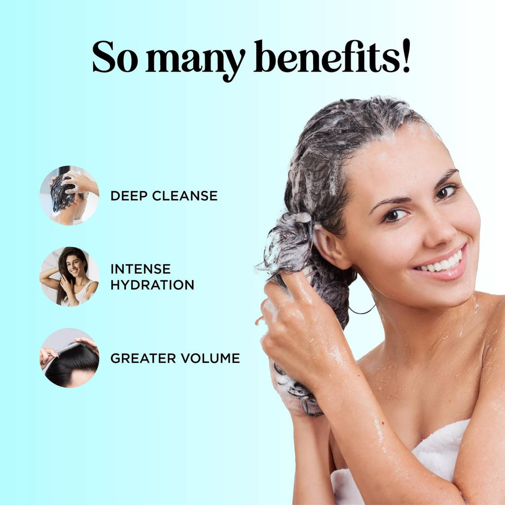 Woman lathering wet hair with foamy shampoo during use