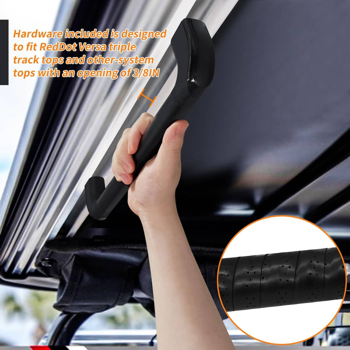 Black golf cart grab handle with textured grip, held by hand