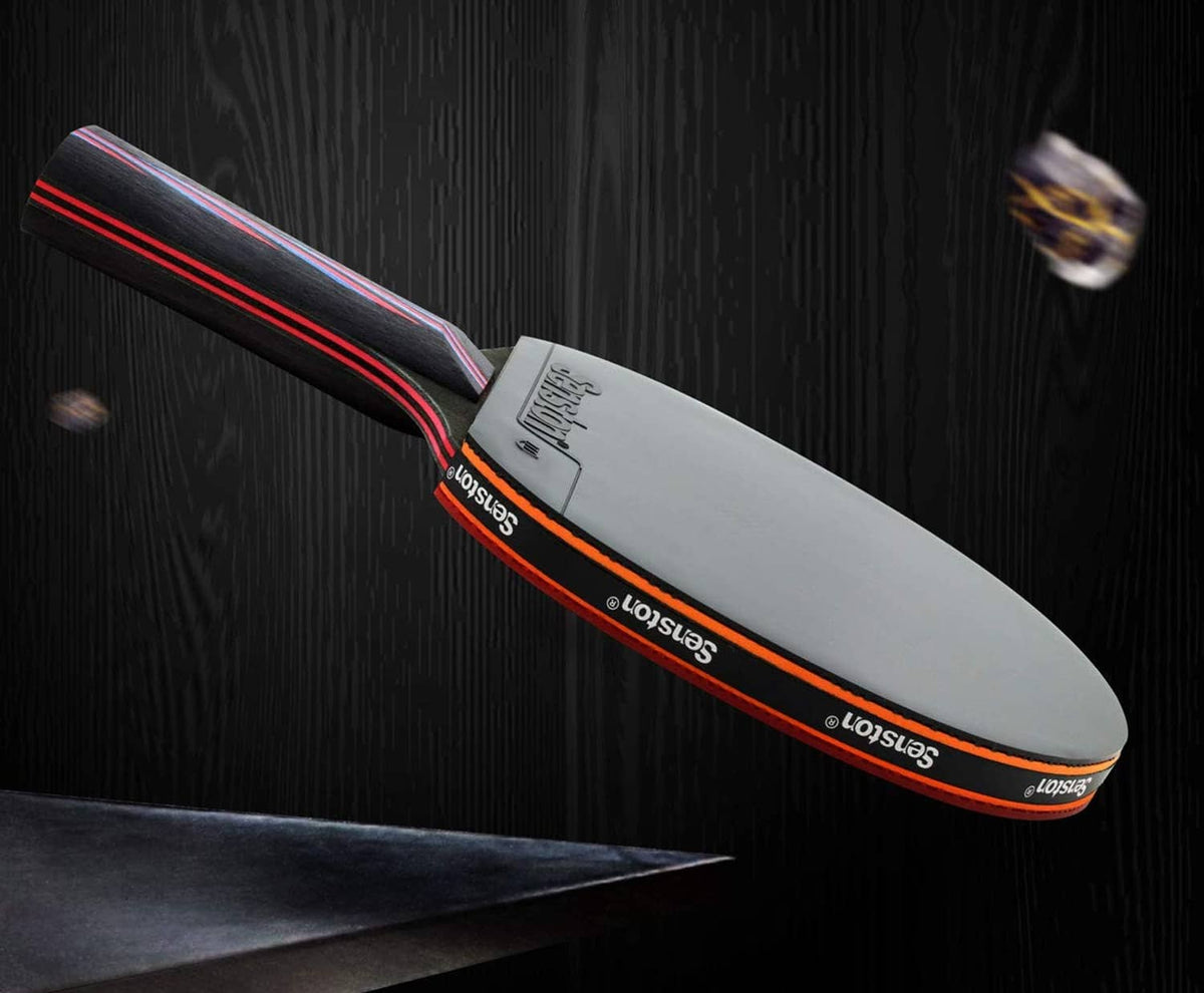 Table tennis paddle with gray blade and dark red-black handle
