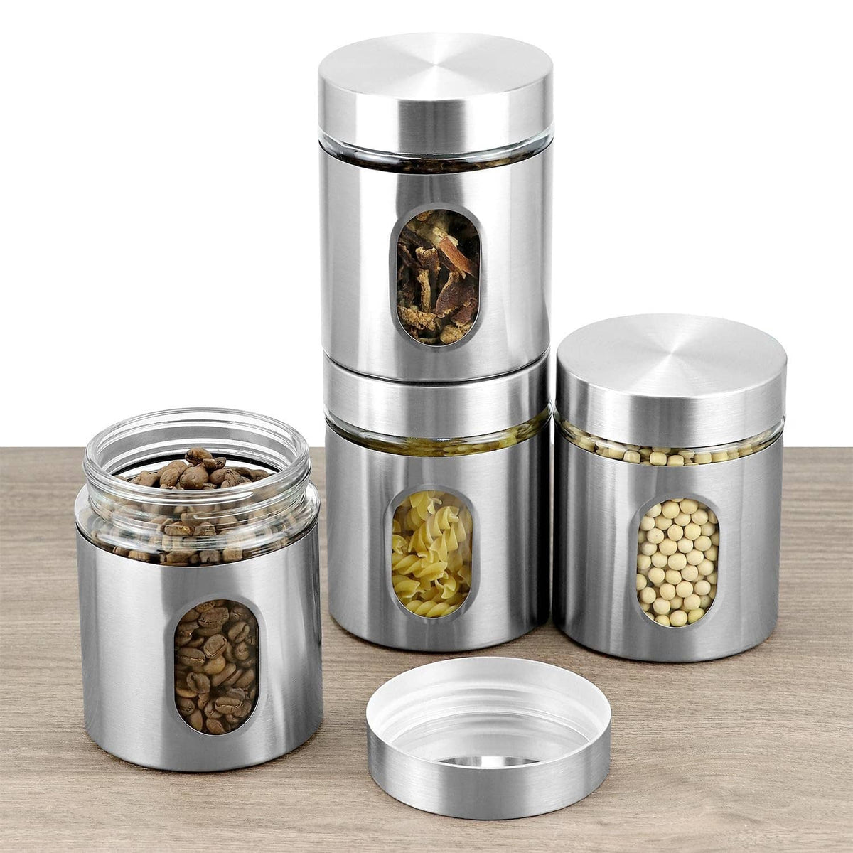 Stainless steel airtight canisters with clear windows; one jar open with lid pieces