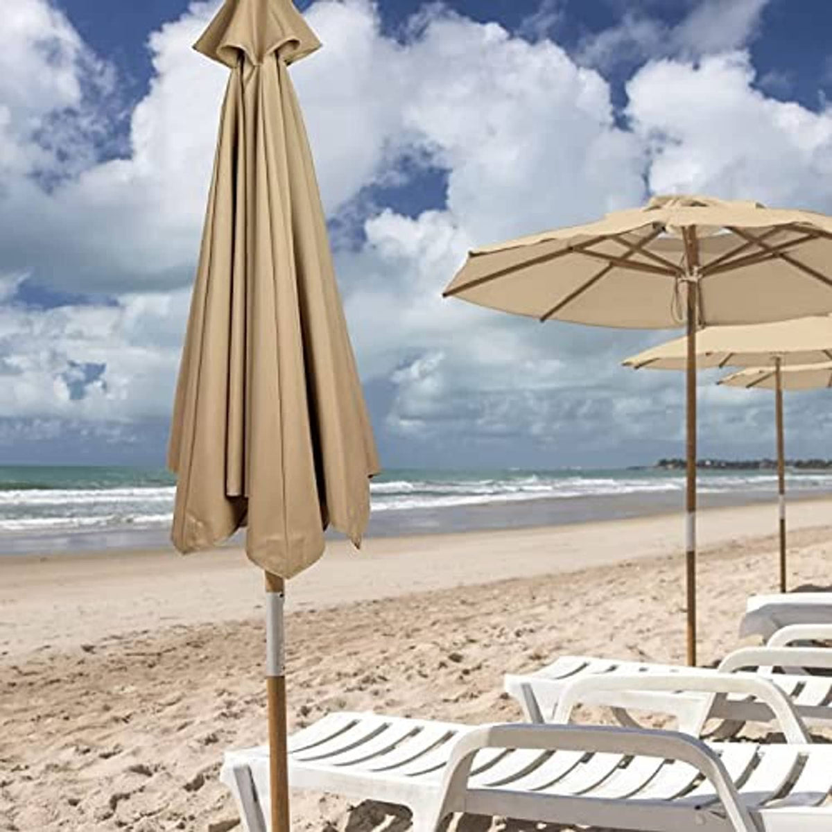 Tan outdoor umbrella canopy replacement with hanging skirt panels