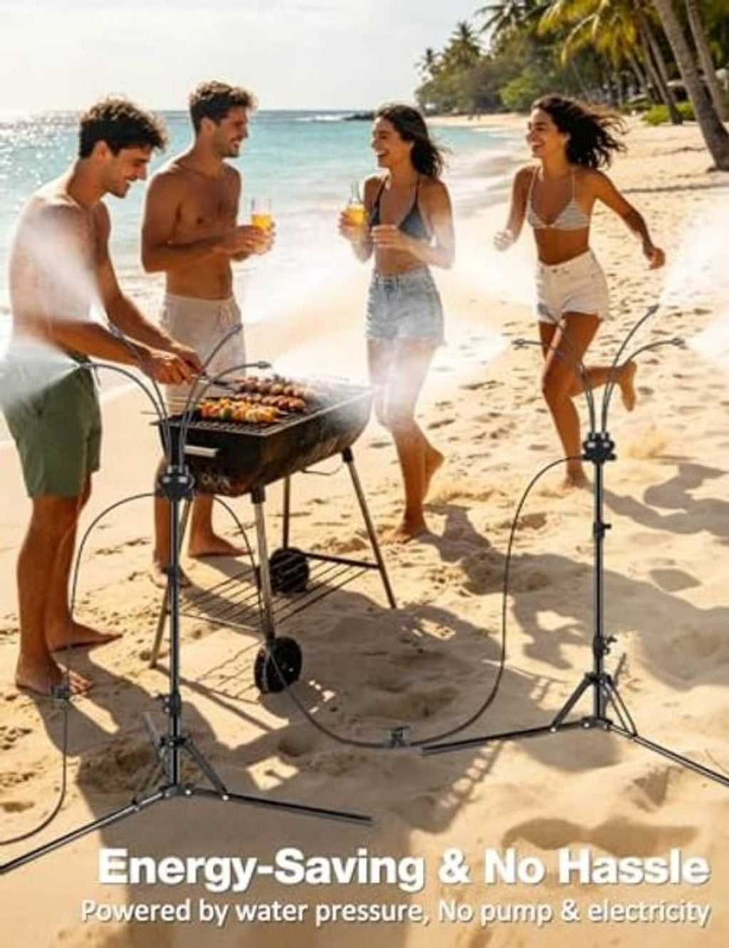 Black standing patio misting system on beach sand with tripod spray heads