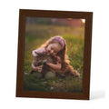 Walnut wood 8x10 picture frame standing with real glass and a portrait photo inside