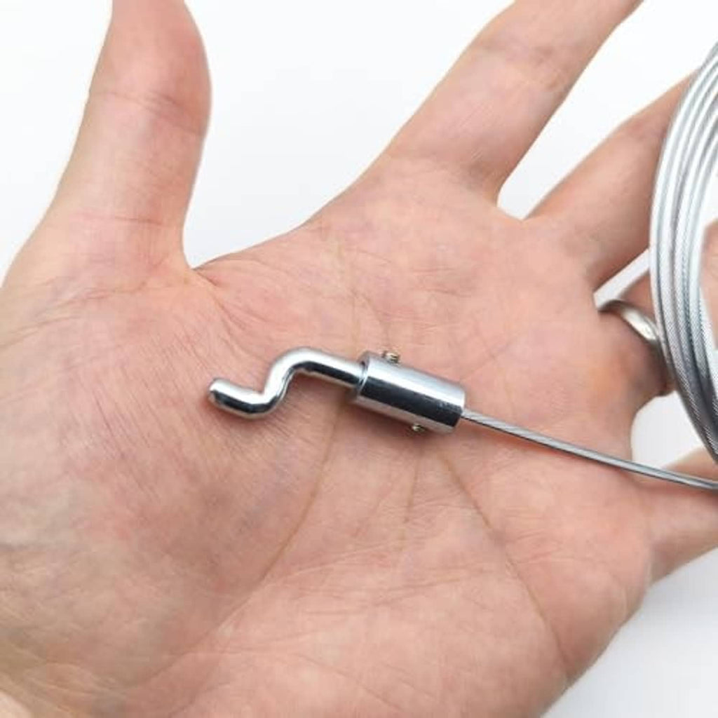 Adjustable Z-bend throttle cable end fitting in hand with attached cable